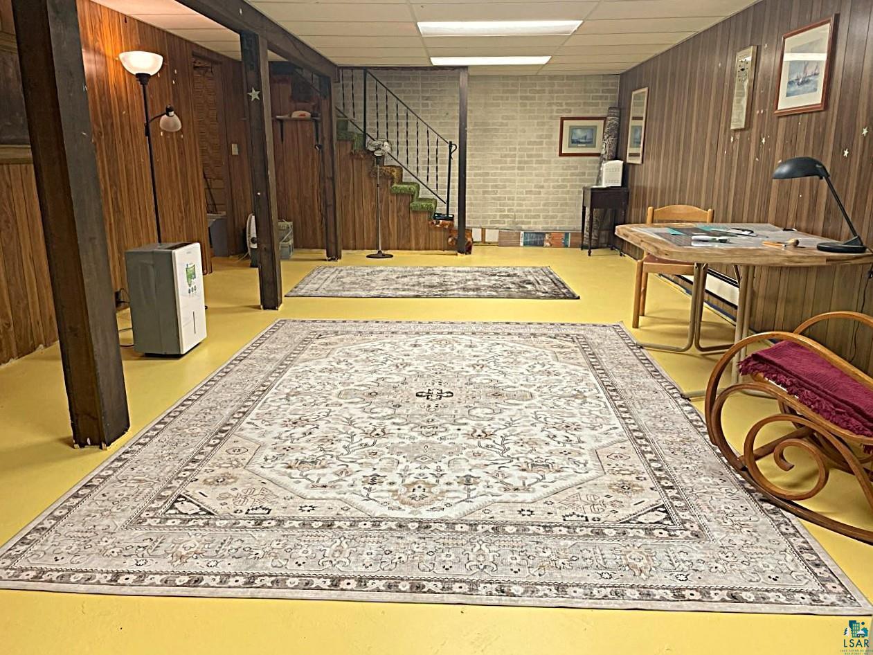 42 Locust Drive Babbitt, MN 55706 - Photo 26 of 50 25' x 14.5' lower level rec room allows for multi=purposes.
