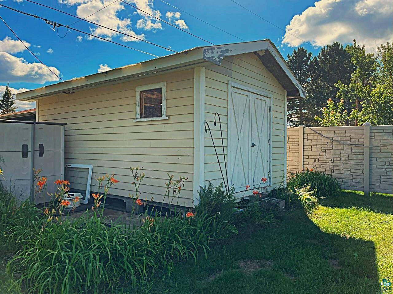 42 Locust Drive Babbitt, MN 55706 - Photo 38 of 50 Why clutter up the garages with outdoor equipment & accessory storage!