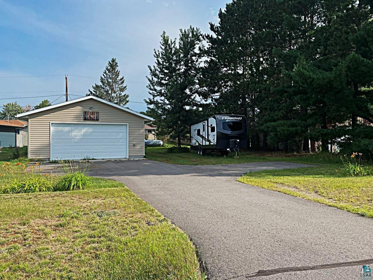 42 Locust Drive Babbitt, MN 55706 - Photo 47 of 50 Street view of Maple Blvd lot with detached garage & ample off-street parking.