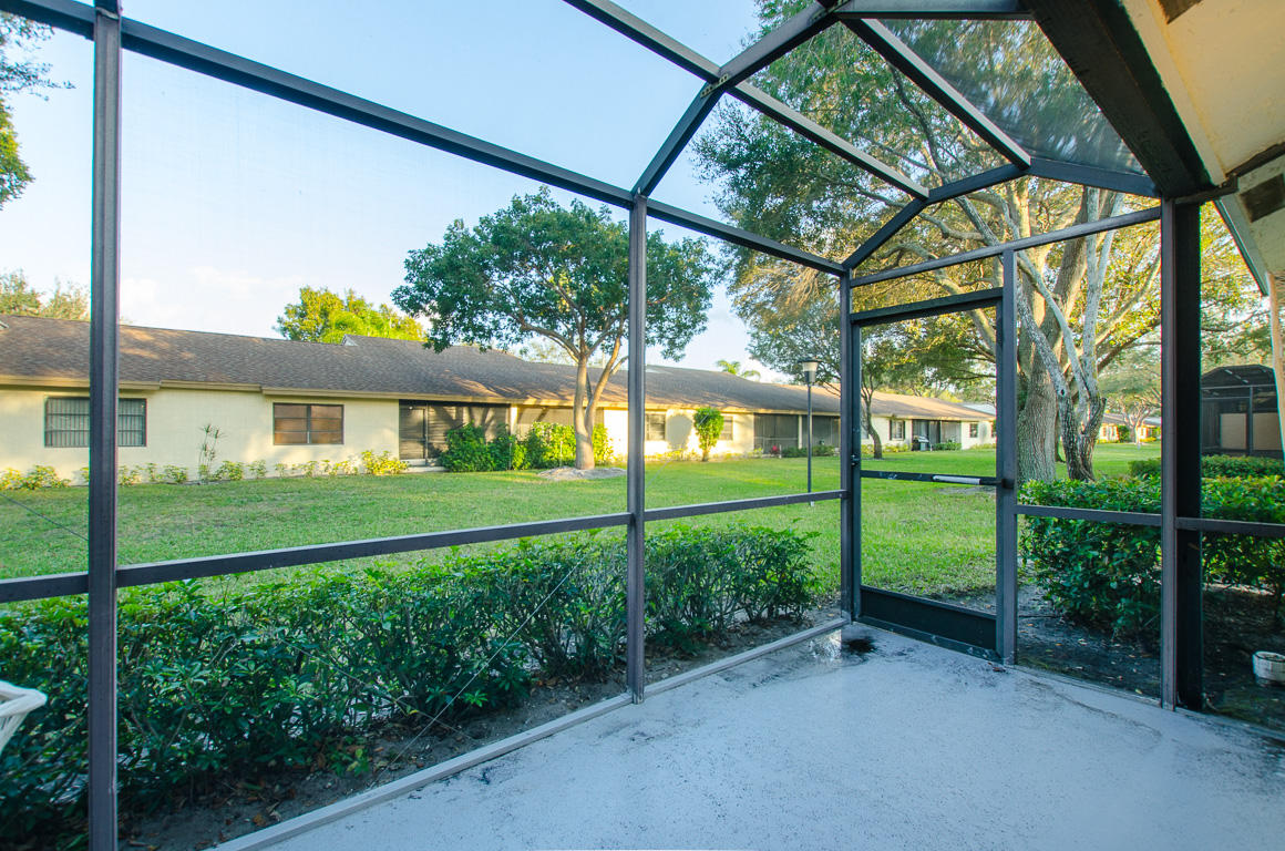 18538 Horizon Avenue, Unit D Boca Raton, FL 33496 - Photo 18 of 33 Back Screned-In Patio