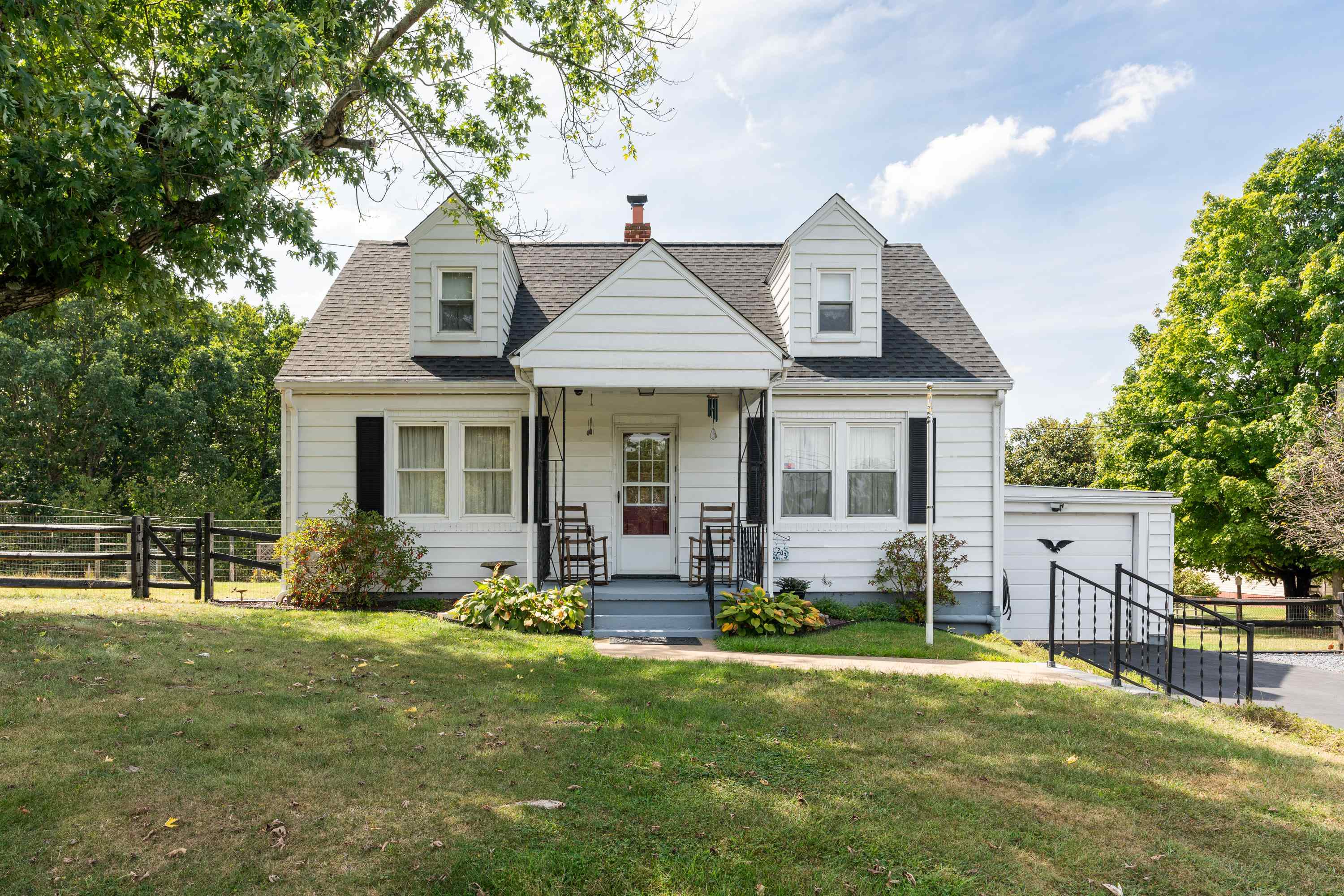 203 Jericho Road Fishersville, VA 22939 - Photo 1 of 13 a front view of a house with garden