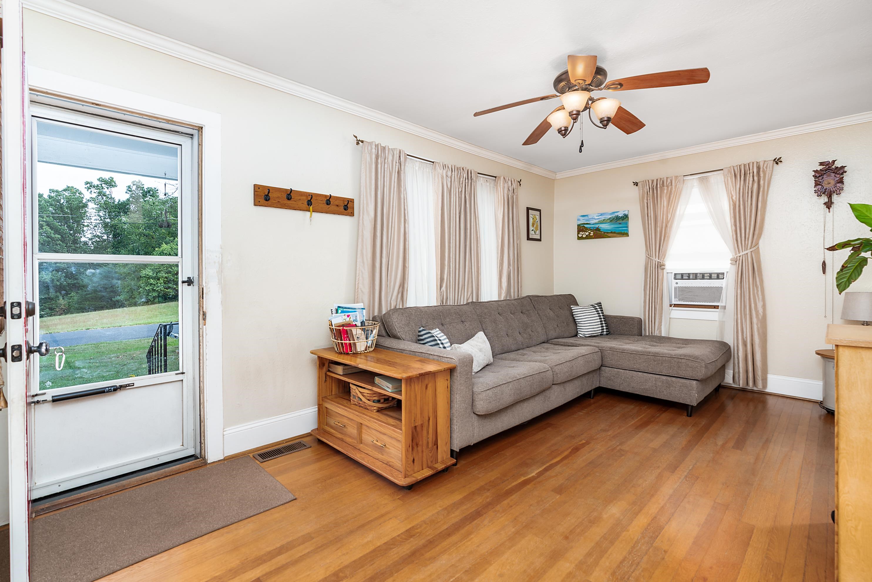 203 Jericho Road Fishersville, VA 22939 - Photo 2 of 13 a living room with furniture and a large window