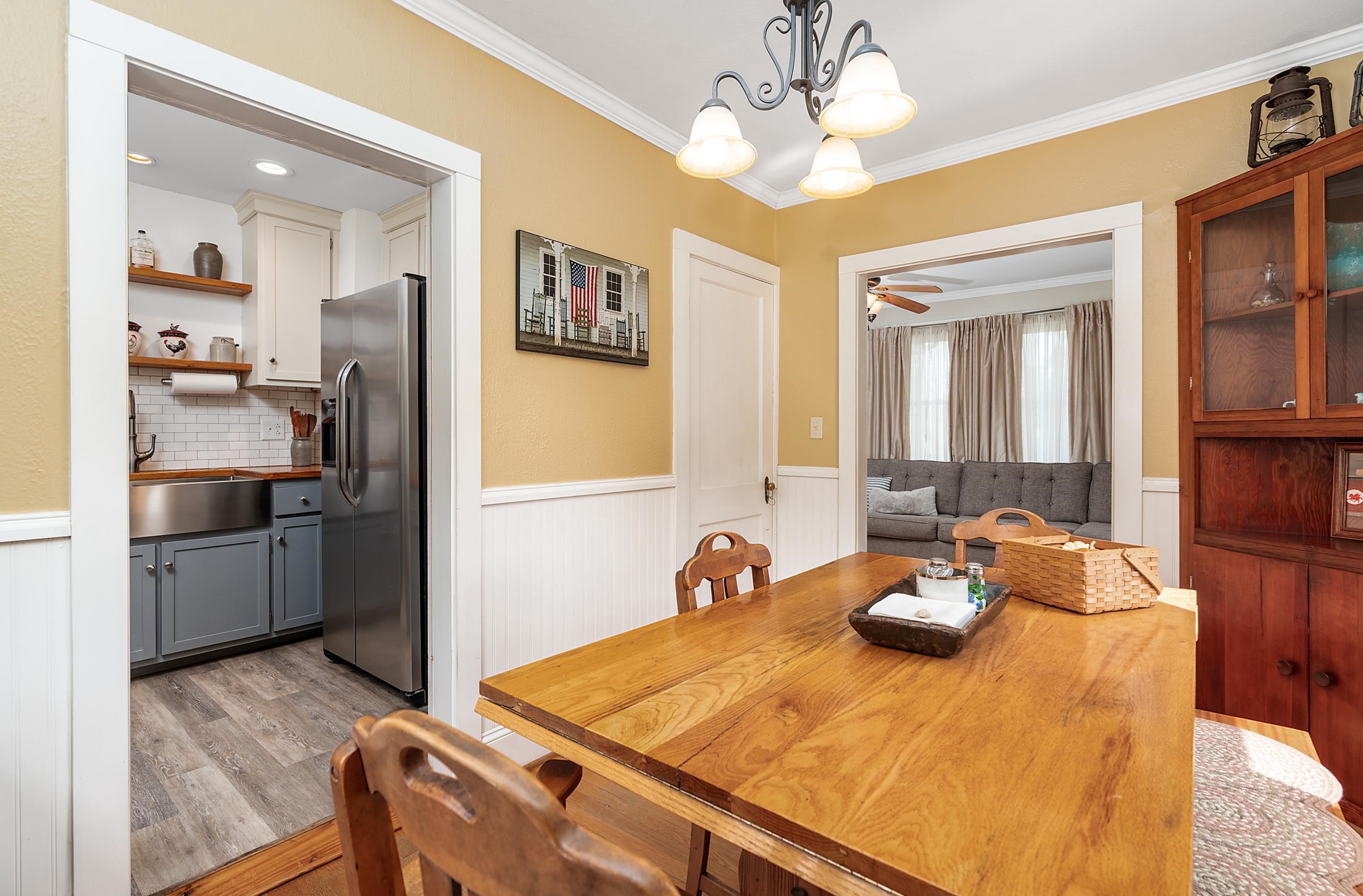 203 Jericho Road Fishersville, VA 22939 - Photo 5 of 13 a view of a dining room and kitchen with a table chairs a workspace