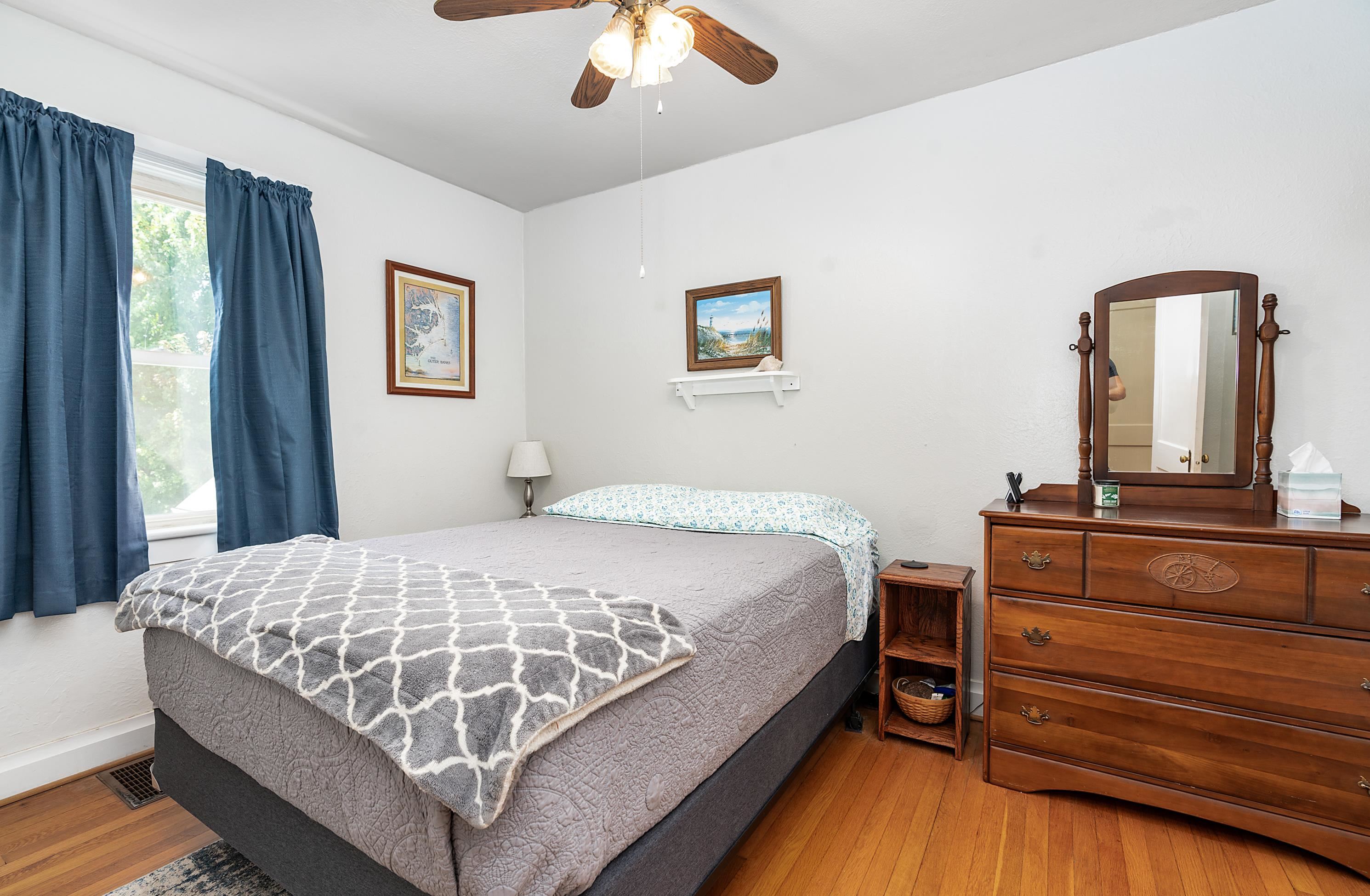 203 Jericho Road Fishersville, VA 22939 - Photo 8 of 13 a bedroom with a bed and a dresser
