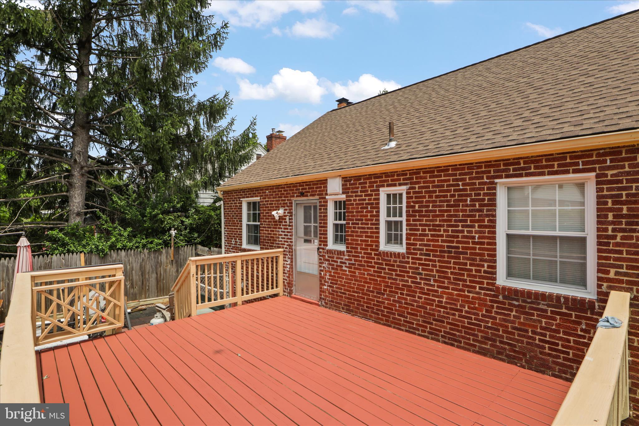 10602 Edgewood Avenue Silver Spring, MD 20901 - Photo 11 of 66 a backyard of a house with wooden deck