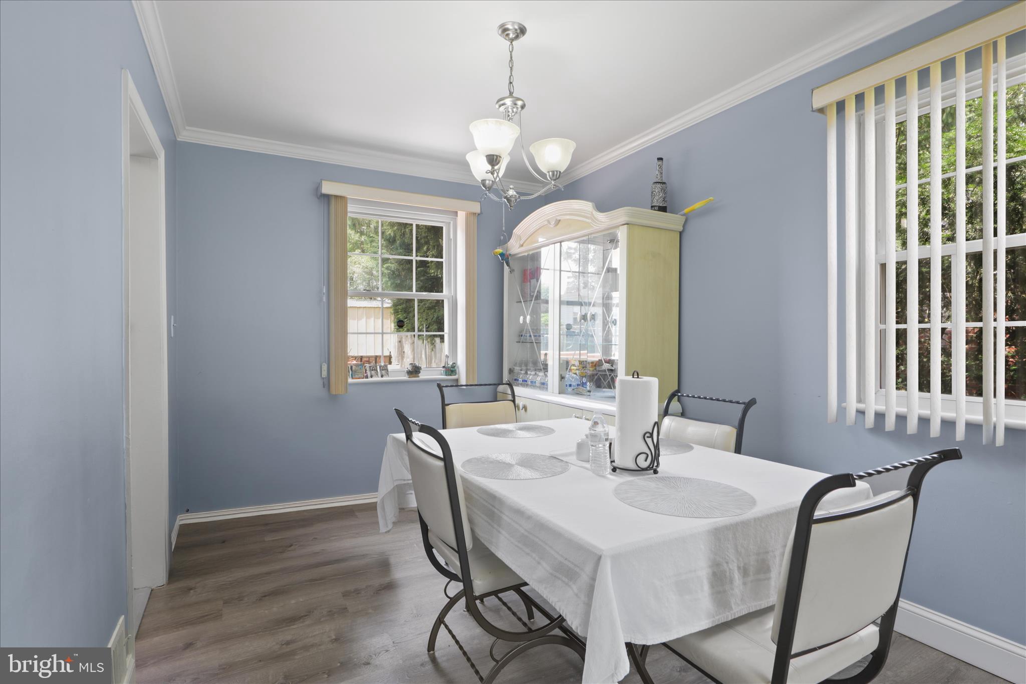 10602 Edgewood Avenue Silver Spring, MD 20901 - Photo 14 of 66 a view of a dining room with furniture window and wooden floor