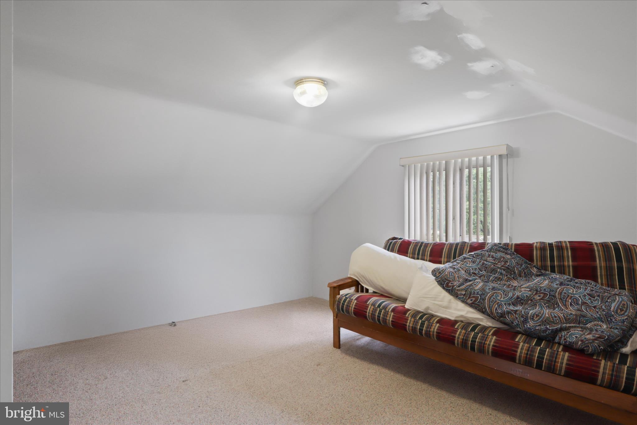 10602 Edgewood Avenue Silver Spring, MD 20901 - Photo 25 of 66 a living room with furniture and a window