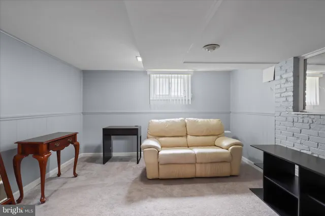 a view of a living room and dining room