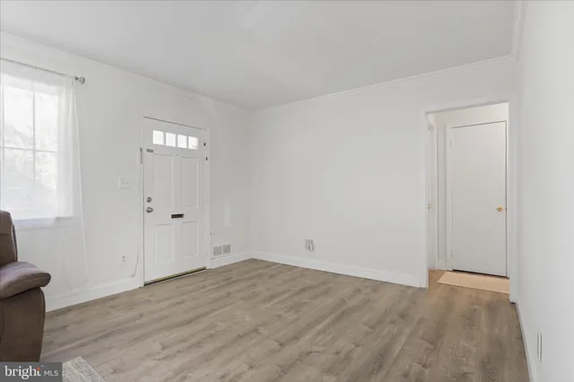 a kitchen with stainless steel appliances granite countertop a stove a refrigerator and a sink