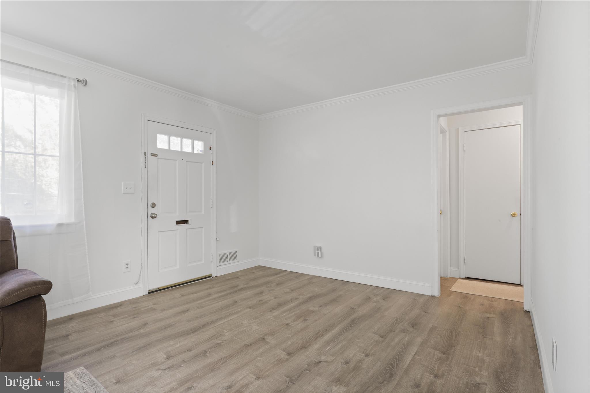 10602 Edgewood Avenue Silver Spring, MD 20901 - Photo 36 of 66 wooden floor in an empty room
