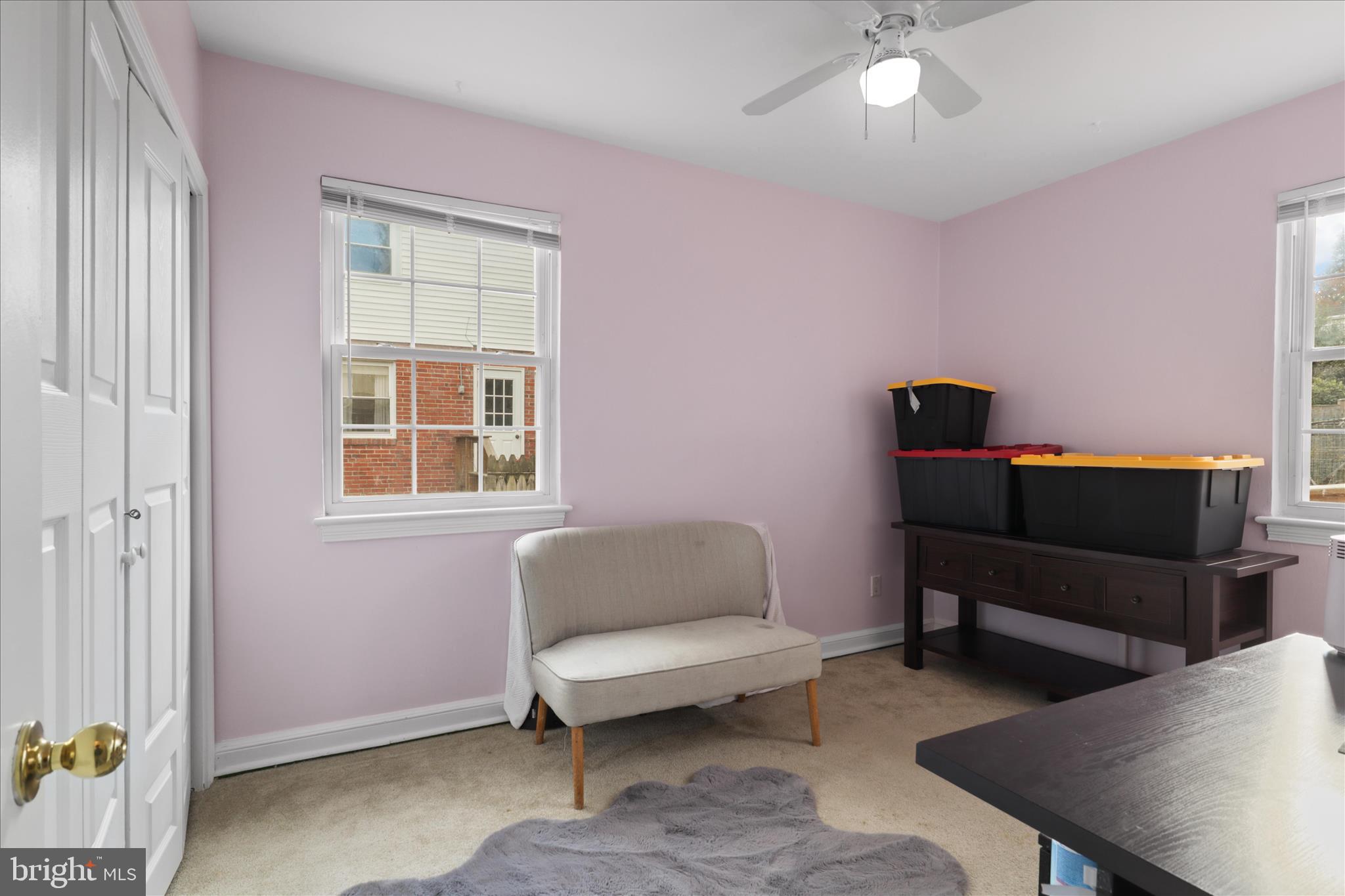 10602 Edgewood Avenue Silver Spring, MD 20901 - Photo 45 of 66 a living room with furniture and a window
