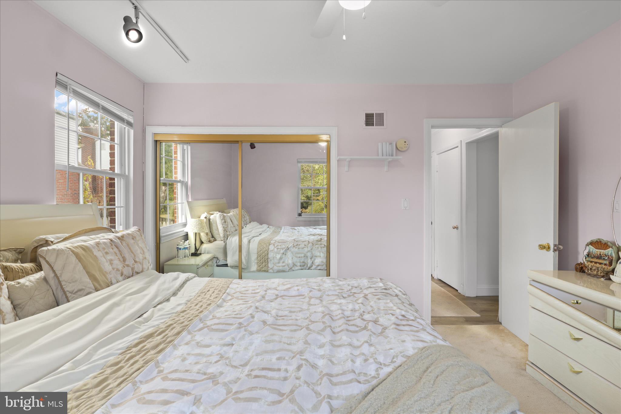 10602 Edgewood Avenue Silver Spring, MD 20901 - Photo 51 of 66 a bedroom with a bed and a couch