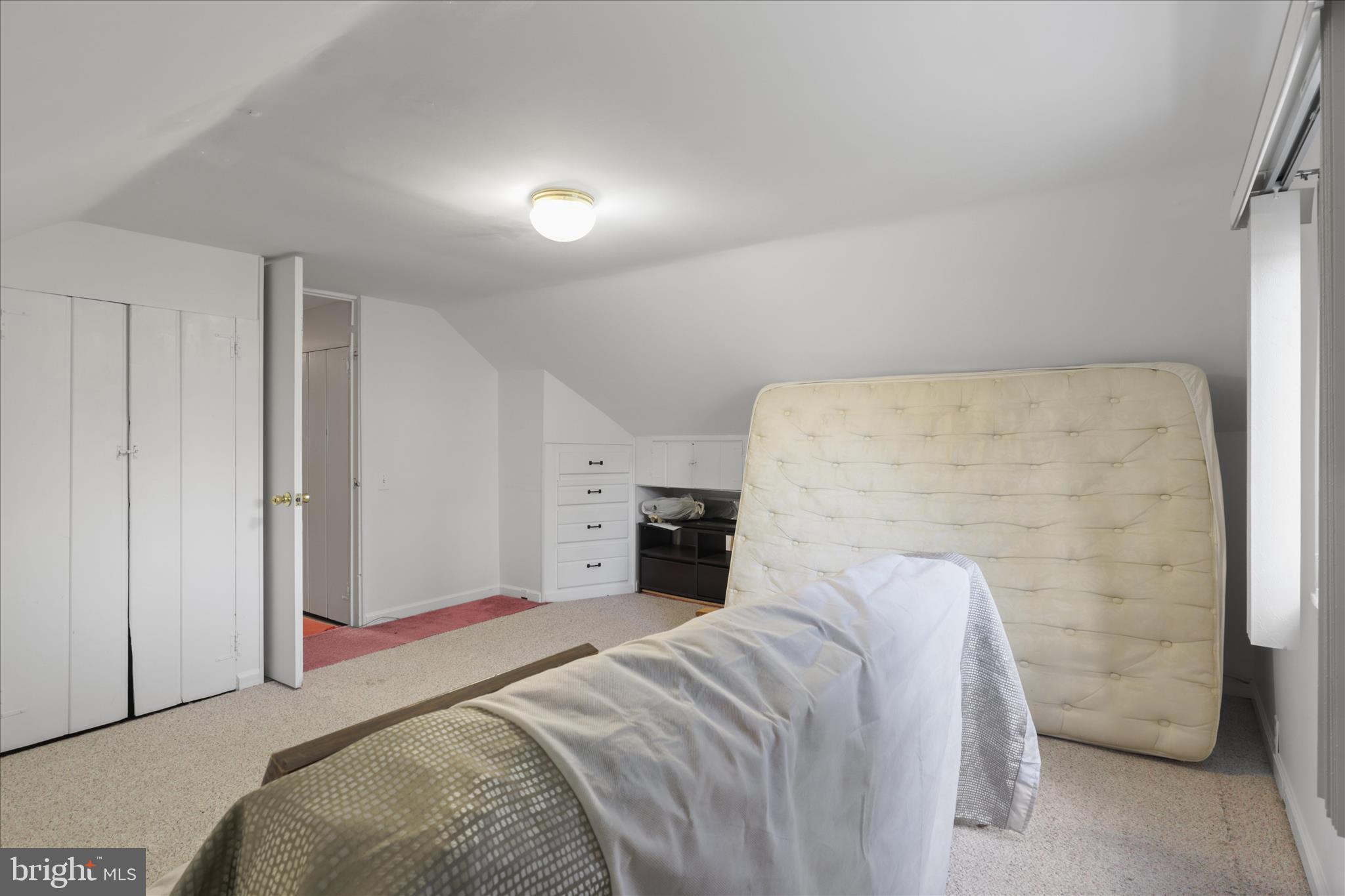 10602 Edgewood Avenue Silver Spring, MD 20901 - Photo 55 of 66 a bed room with a bed and a fireplace