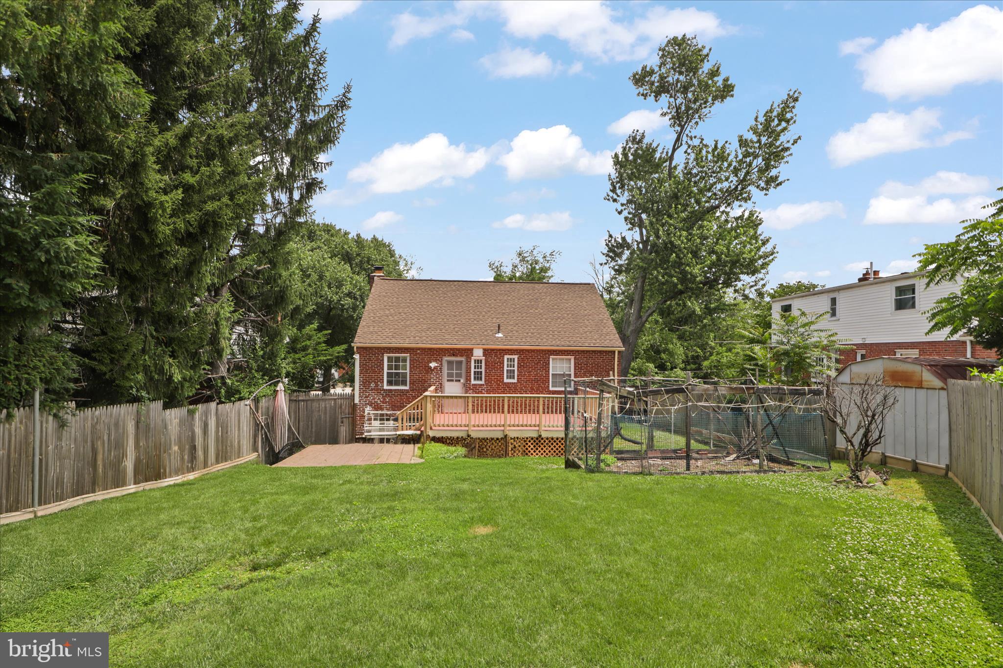 10602 Edgewood Avenue Silver Spring, MD 20901 - Photo 8 of 66 a view of a house with a yard and sitting area