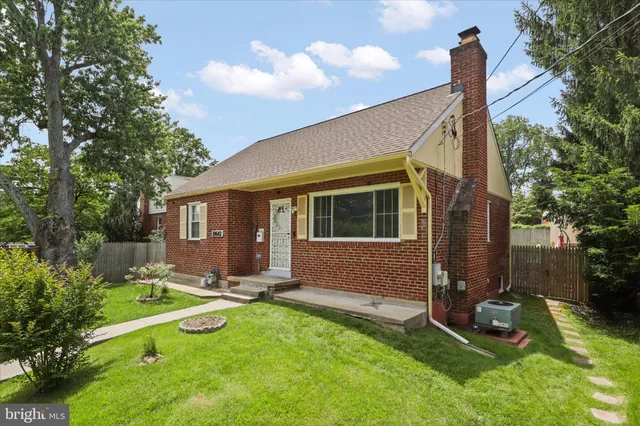 a backyard of a house with wooden deck