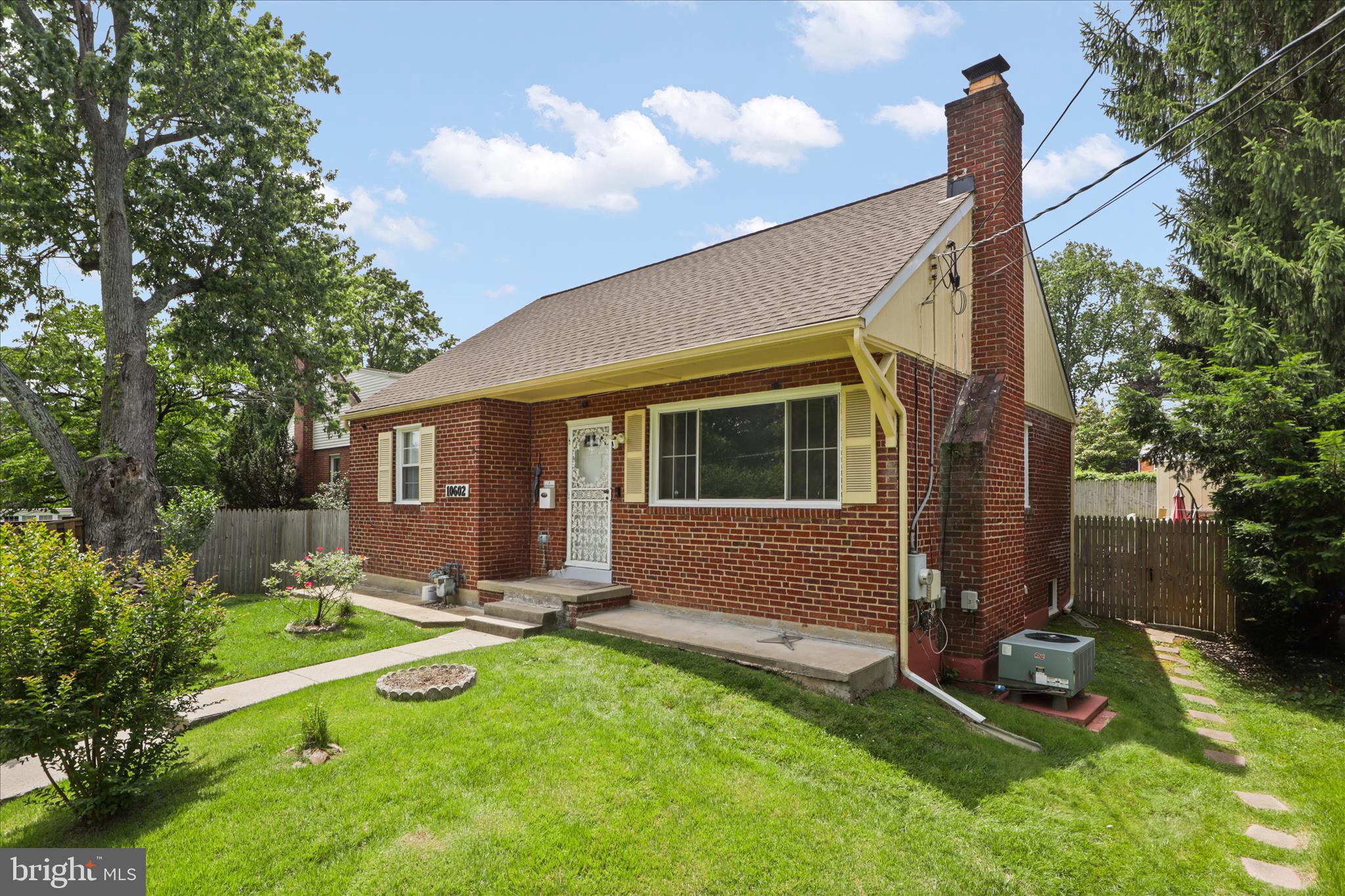 10602 Edgewood Avenue Silver Spring, MD 20901 - Photo 10 of 66 a view of a house with backyard and sitting area