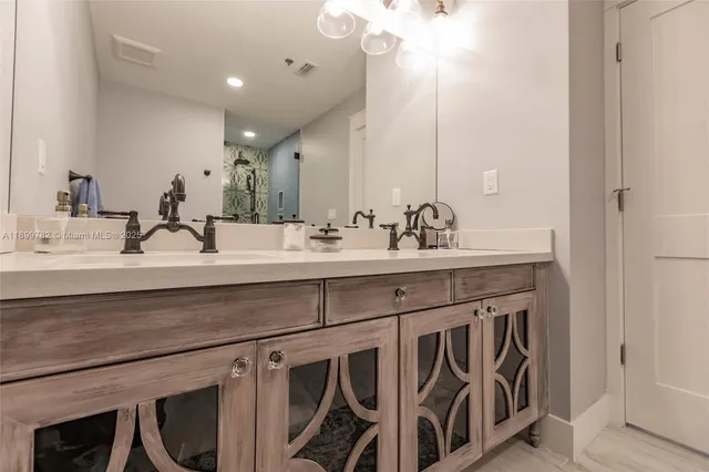 a vase of flowers sitting on a table