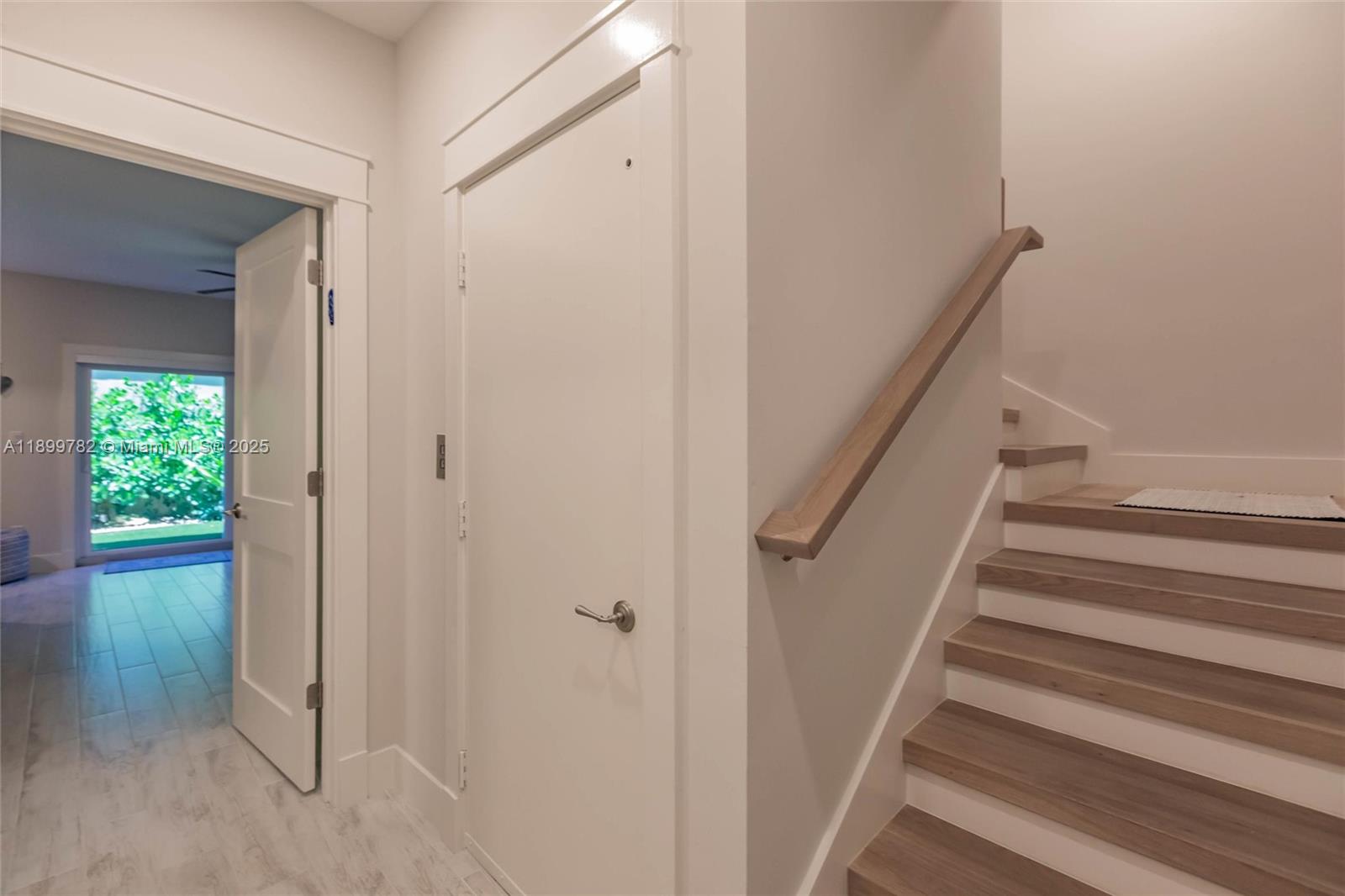 117 Ocean Key Way Jupiter, FL 33477 - Photo 22 of 57 a view of entryway with wooden floor and a livingroom view