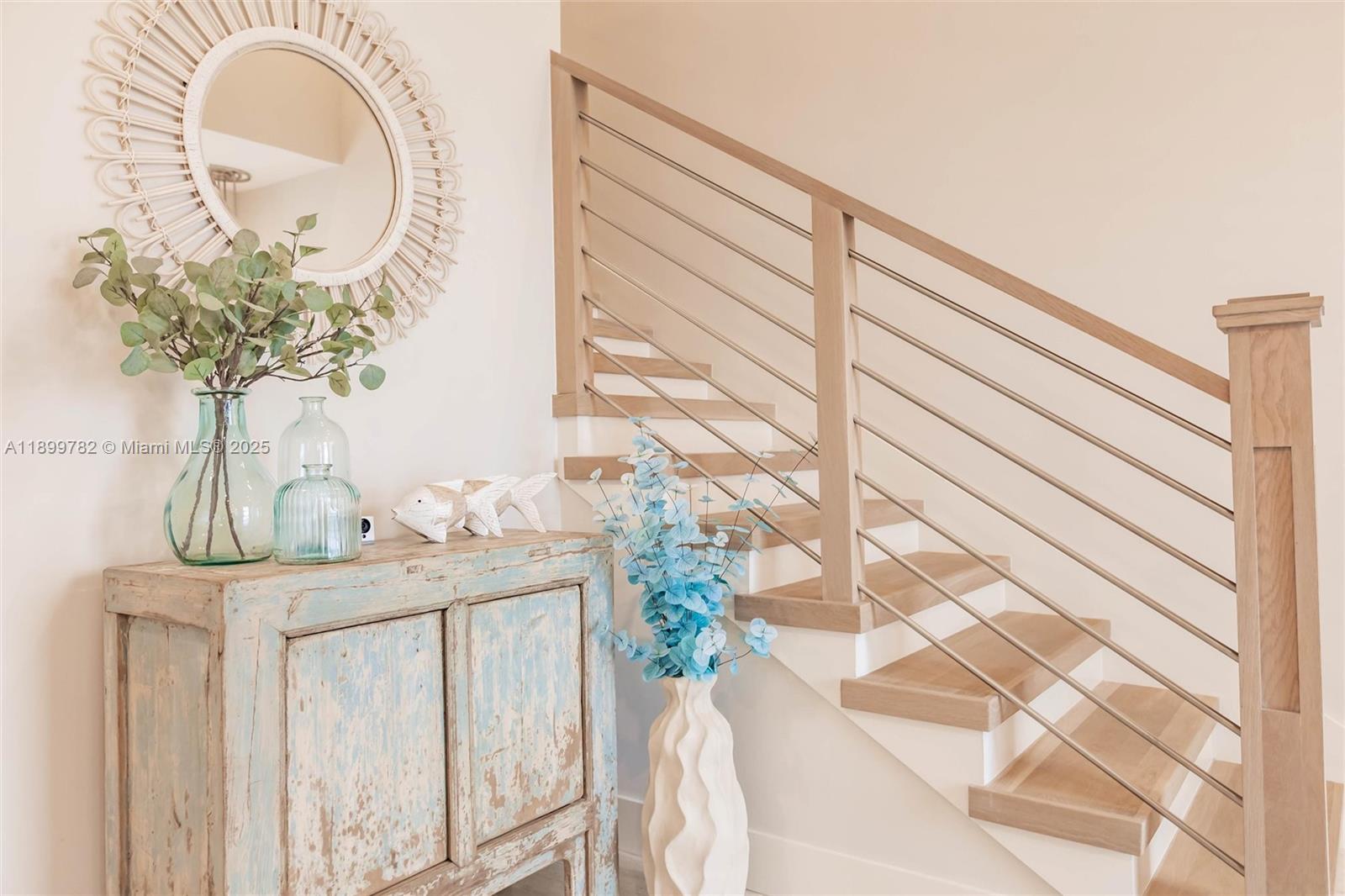 117 Ocean Key Way Jupiter, FL 33477 - Photo 27 of 57 a vase of flowers sitting on a table