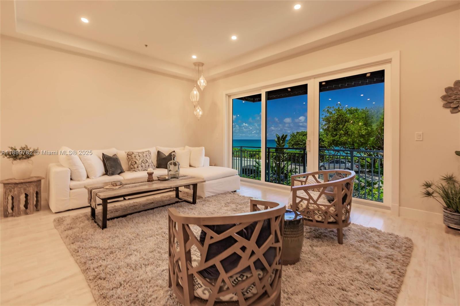 117 Ocean Key Way Jupiter, FL 33477 - Photo 28 of 57 a living room with furniture and a large window