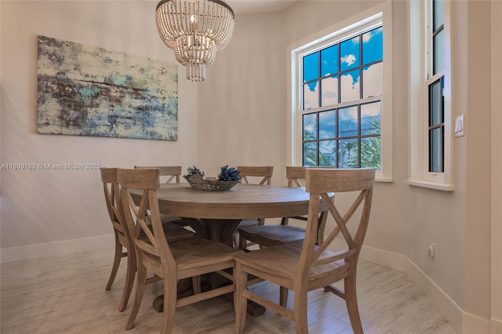 117 Ocean Key Way Jupiter, FL 33477 - Photo 34 of 57 a view of a dining room with furniture and window