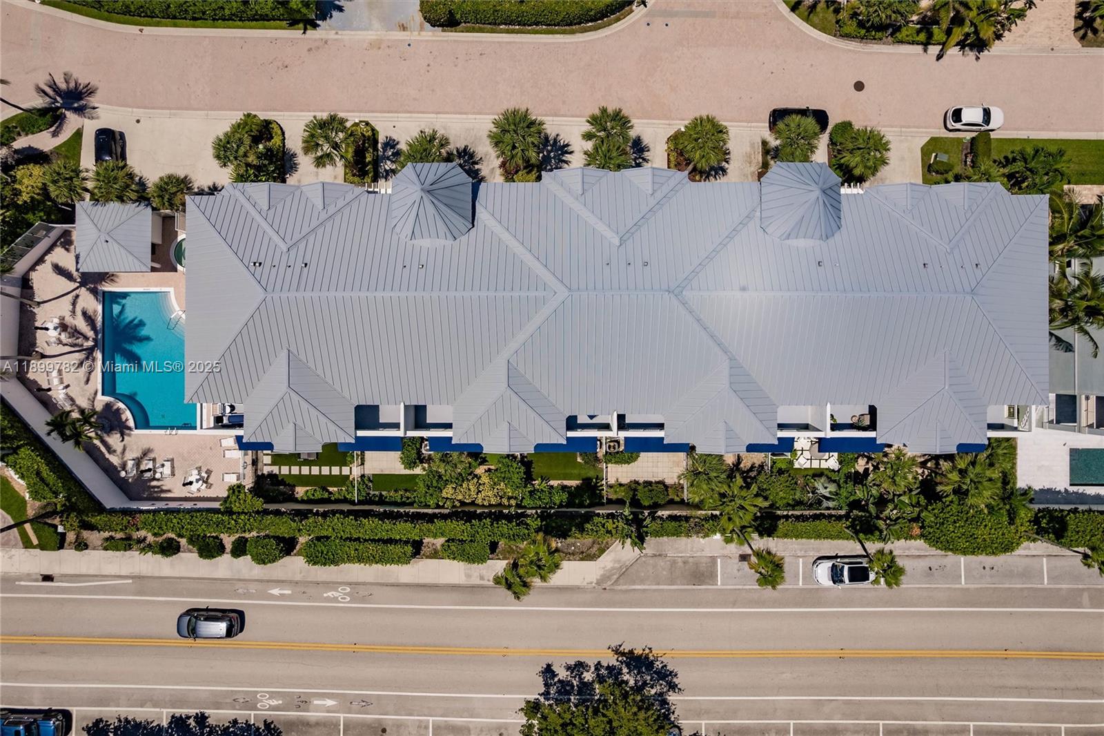 117 Ocean Key Way Jupiter, FL 33477 - Photo 55 of 57 an aerial view of a house with a garden