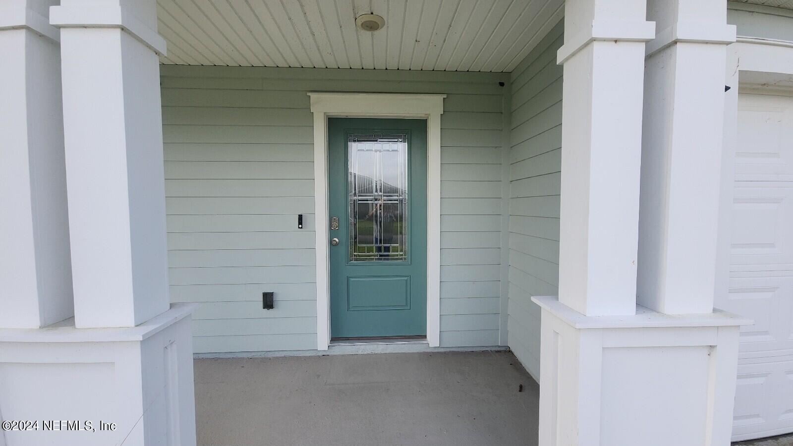 289 Narvarez Circle St. Augustine, FL 32084 - Photo 2 of 25 a view of a hallway with brick walls