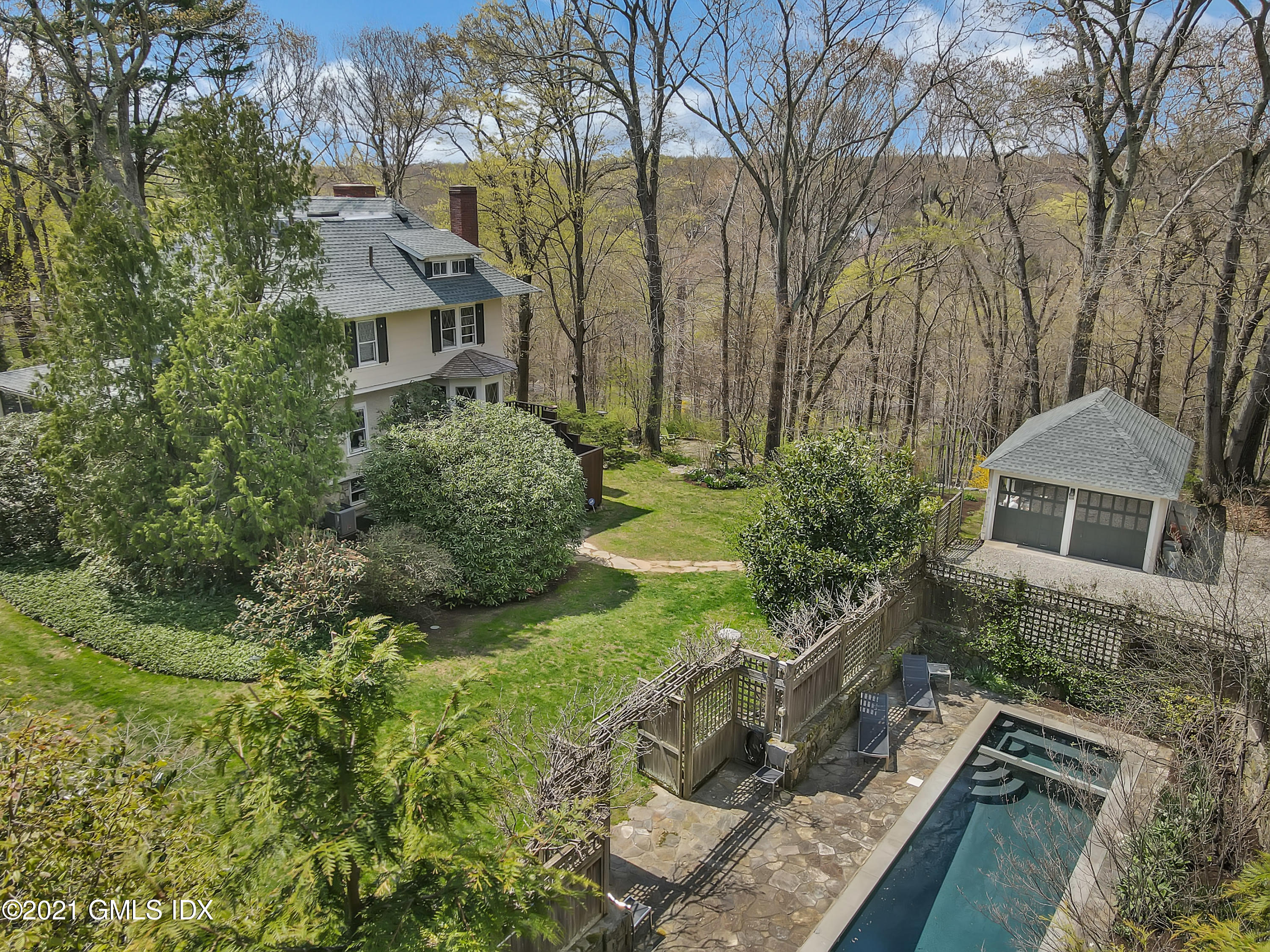 97 Hillcrest Park Road Old Greenwich, CT 06870 - Photo 1 of 25 a view of a house with a yard