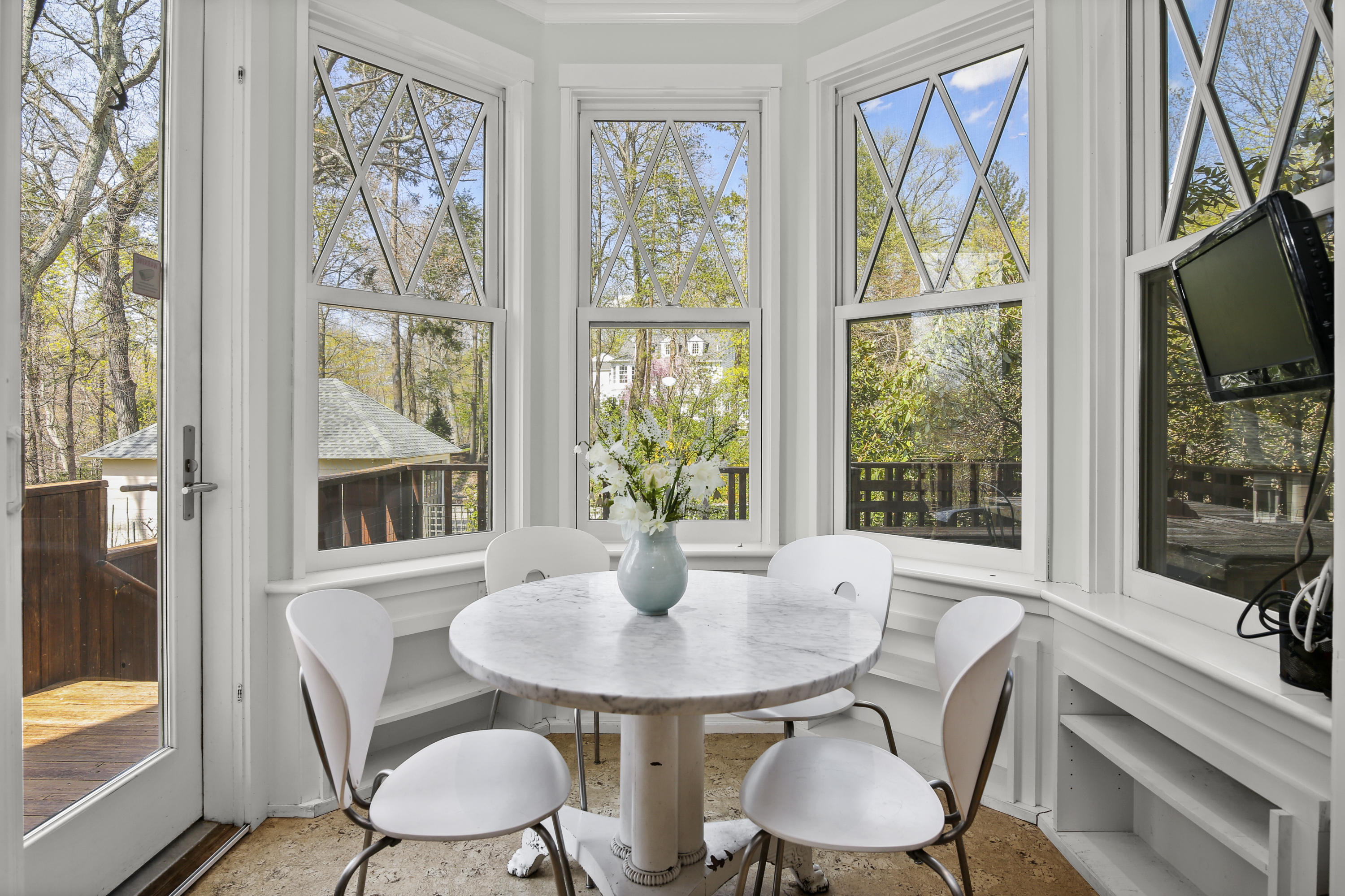 97 Hillcrest Park Road Old Greenwich, CT 06870 - Photo 12 of 25 a view of a dining room with furniture window and outside view