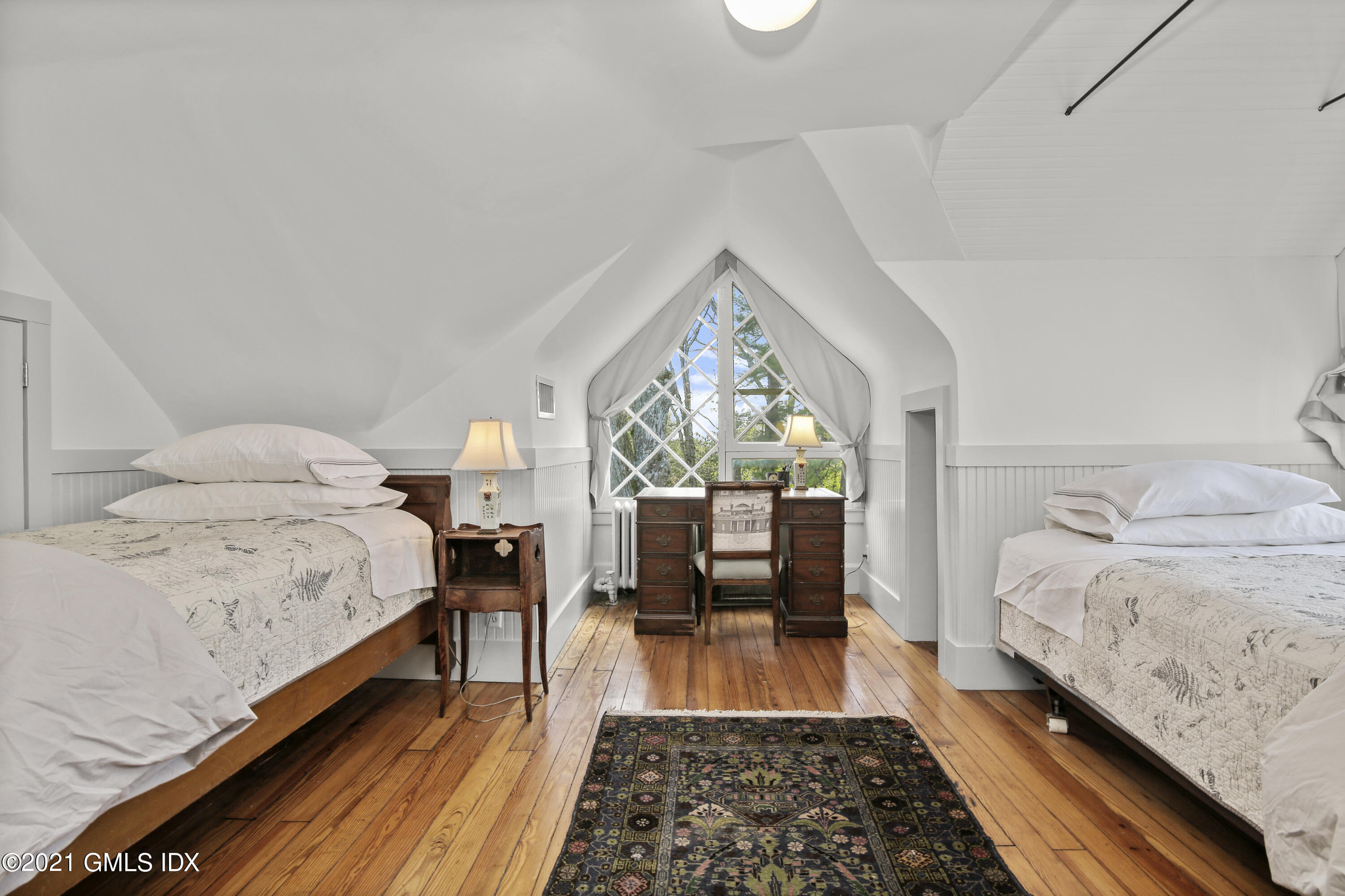 97 Hillcrest Park Road Old Greenwich, CT 06870 - Photo 17 of 25 a bedroom with bed and window