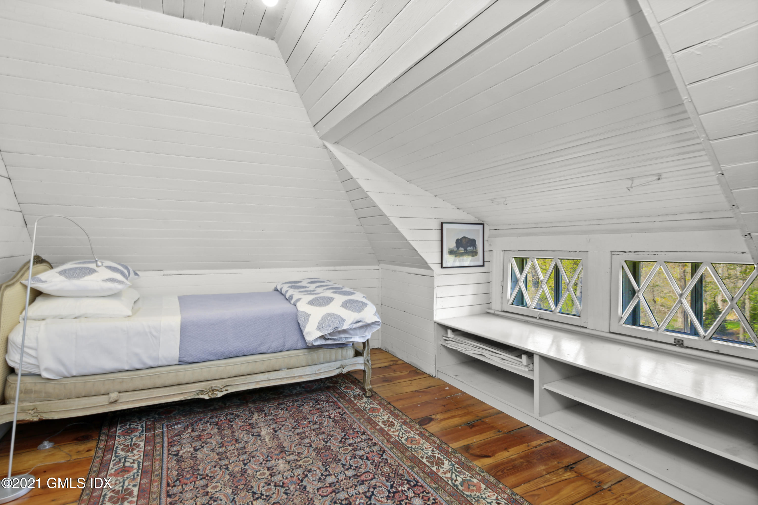 97 Hillcrest Park Road Old Greenwich, CT 06870 - Photo 19 of 25 a bedroom with furniture and window