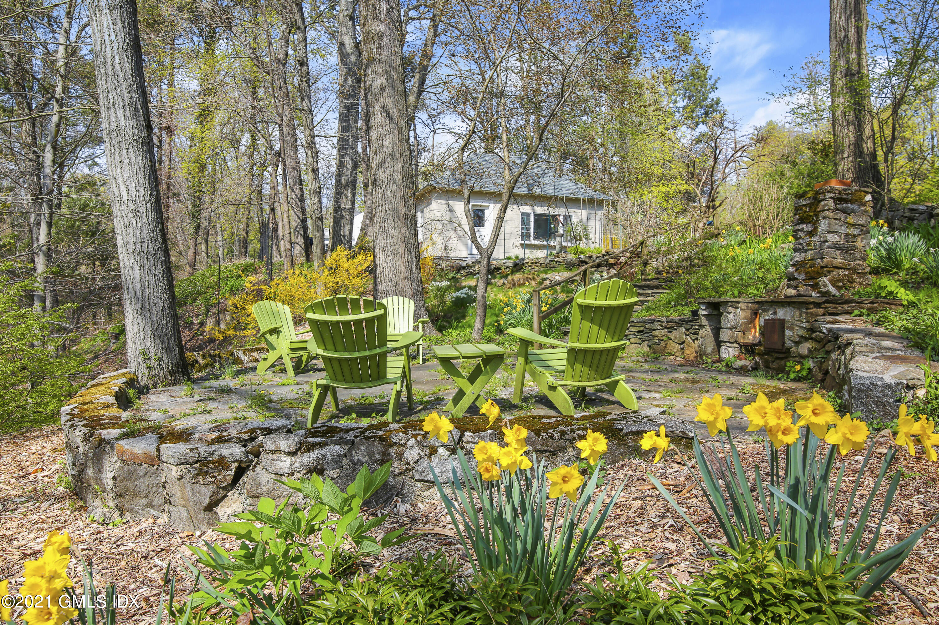 97 Hillcrest Park Road Old Greenwich, CT 06870 - Photo 24 of 25 a view of a backyard
