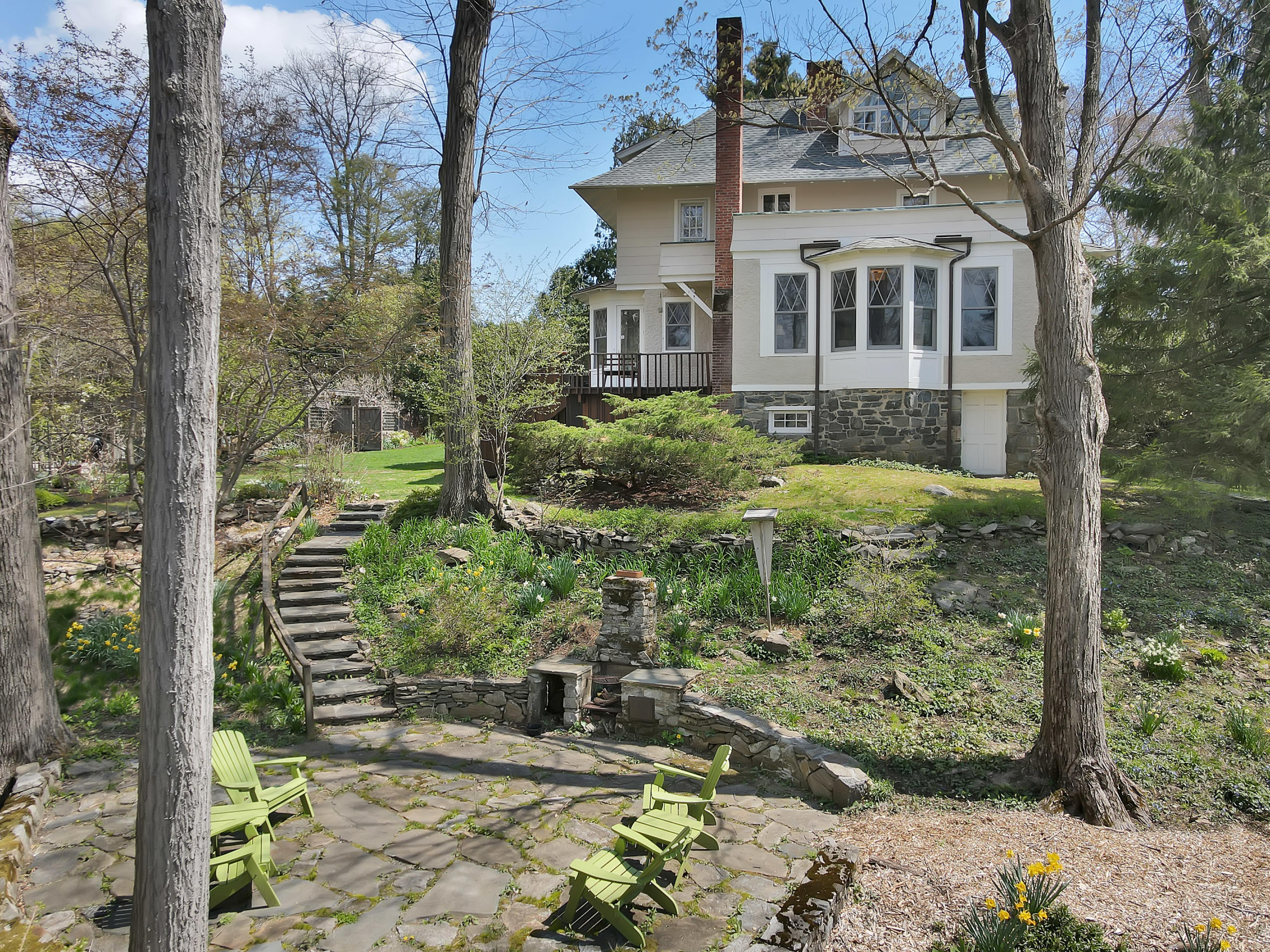 97 Hillcrest Park Road Old Greenwich, CT 06870 - Photo 25 of 25 a front view of a house with a yard