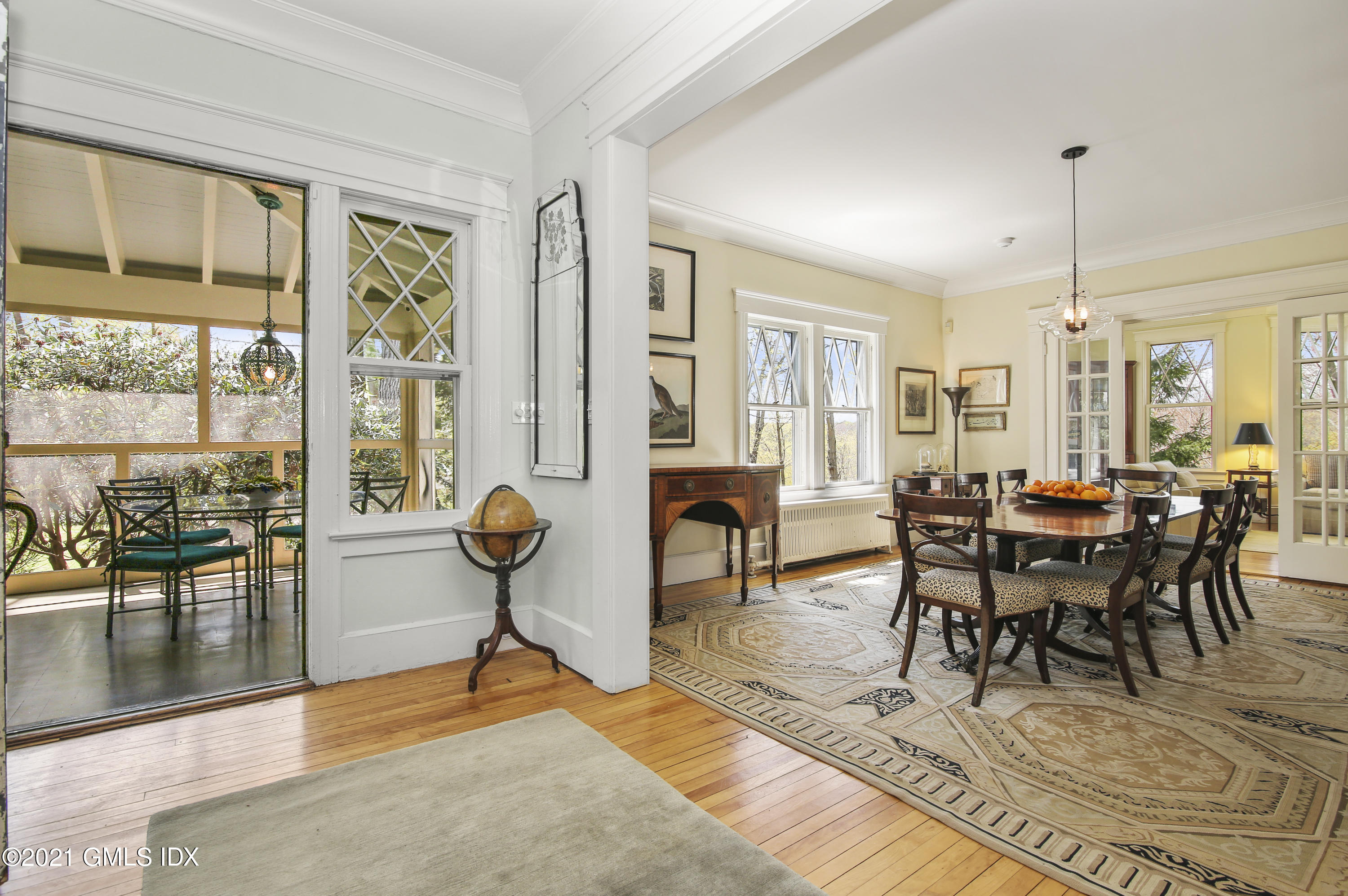 97 Hillcrest Park Road Old Greenwich, CT 06870 - Photo 5 of 25 a view of a livingroom and dining room