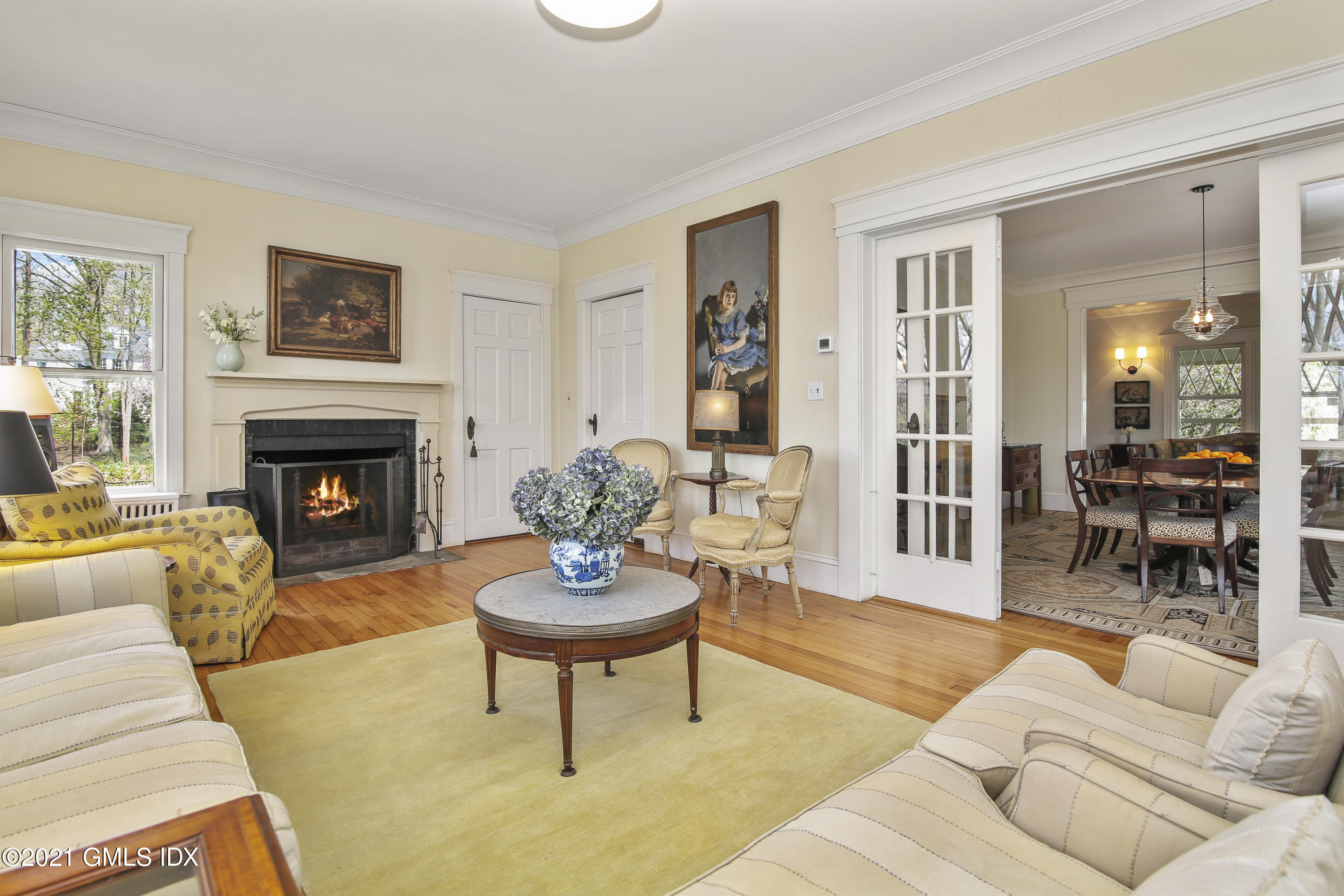 97 Hillcrest Park Road Old Greenwich, CT 06870 - Photo 8 of 25 a living room with furniture and a fireplace