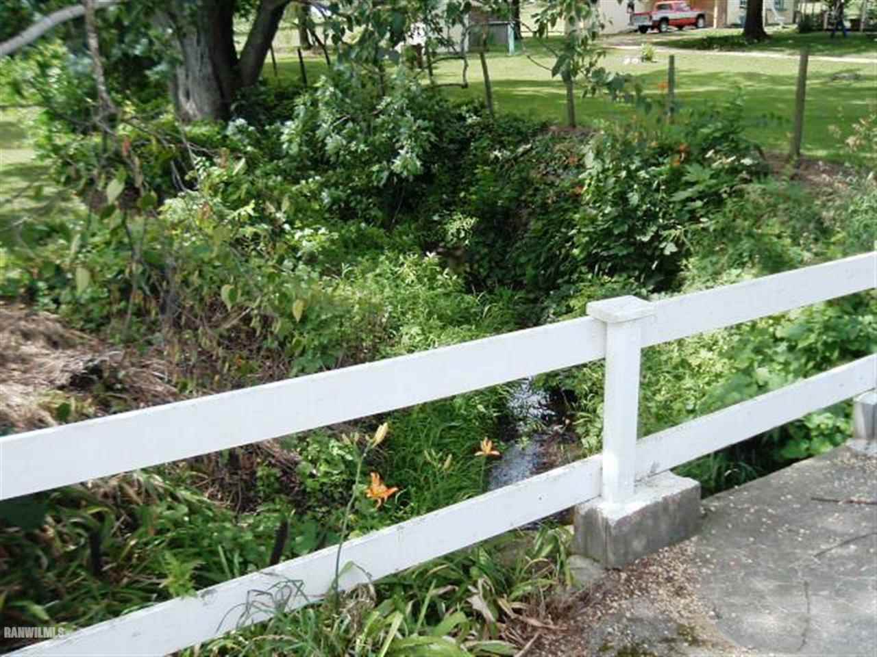 3360 South Rock City Road Ridott, IL 61067 - Photo 6 of 10 a view of a garden from a balcony