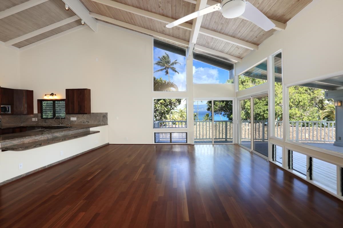 5045 Lower Honoapiilani Road, Unit 6 Lahaina, HI 96761 - Photo 11 of 30 a view of a living room with wooden floor