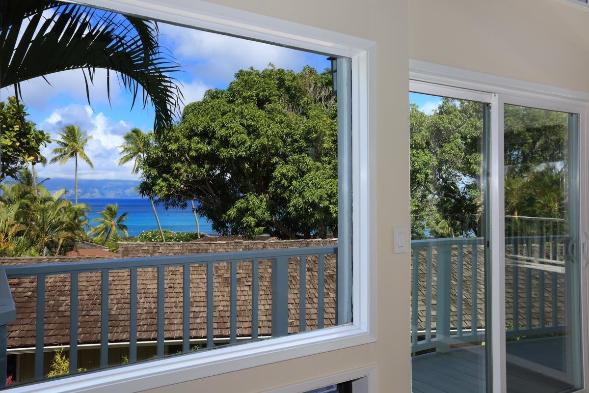 5045 Lower Honoapiilani Road, Unit 6 Lahaina, HI 96761 - Photo 14 of 30 a view of a balcony with plants