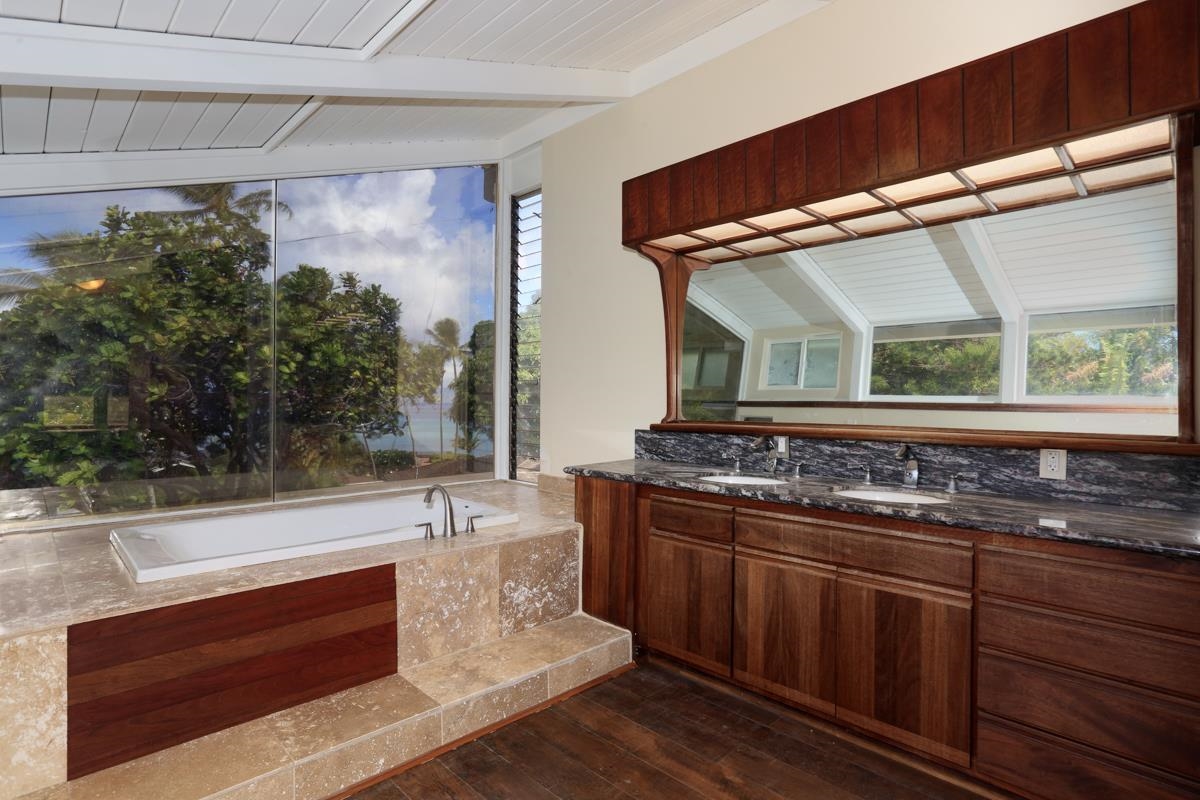 5045 Lower Honoapiilani Road, Unit 6 Lahaina, HI 96761 - Photo 18 of 30 a bathroom with a sink and a mirror