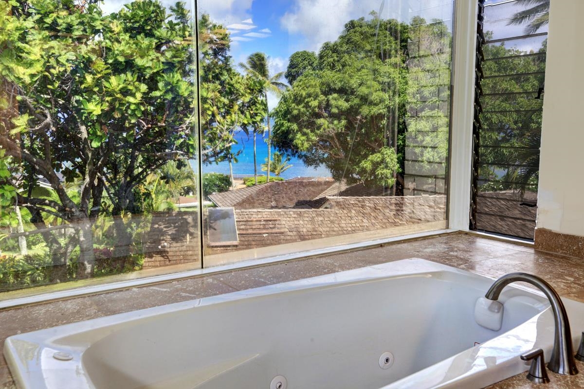 5045 Lower Honoapiilani Road, Unit 6 Lahaina, HI 96761 - Photo 19 of 30 a view of a bench in front of a window