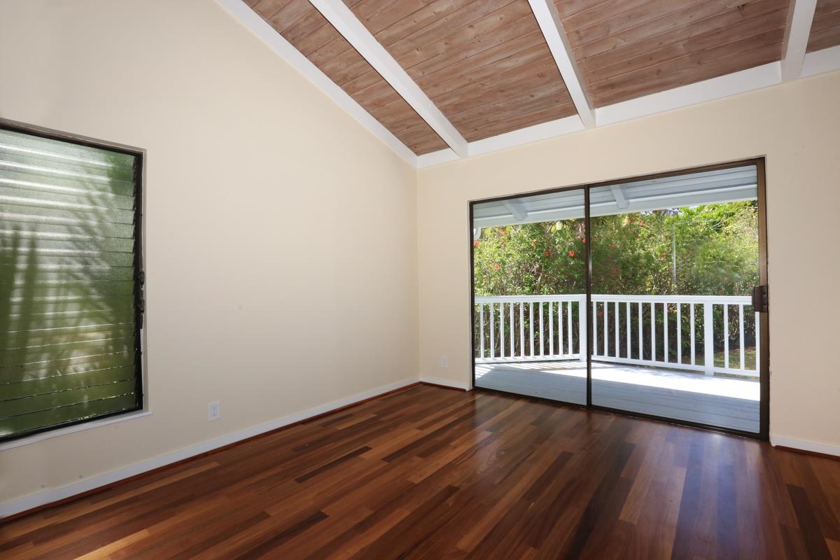 5045 Lower Honoapiilani Road, Unit 6 Lahaina, HI 96761 - Photo 20 of 30 a view of empty room with wooden floor and fan