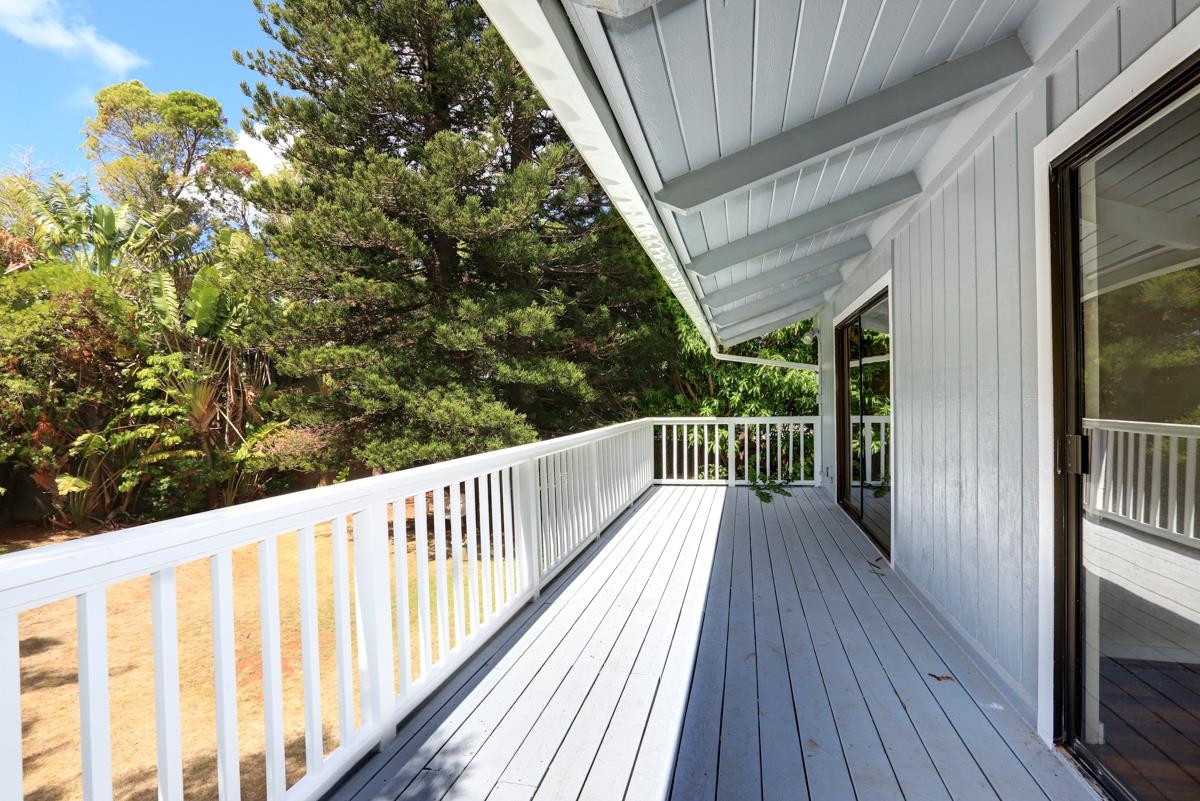 5045 Lower Honoapiilani Road, Unit 6 Lahaina, HI 96761 - Photo 23 of 30 a view of balcony with wooden floor