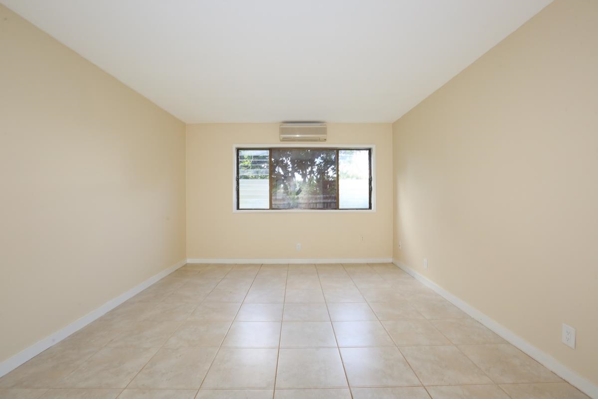 5045 Lower Honoapiilani Road, Unit 6 Lahaina, HI 96761 - Photo 27 of 30 an empty room with windows