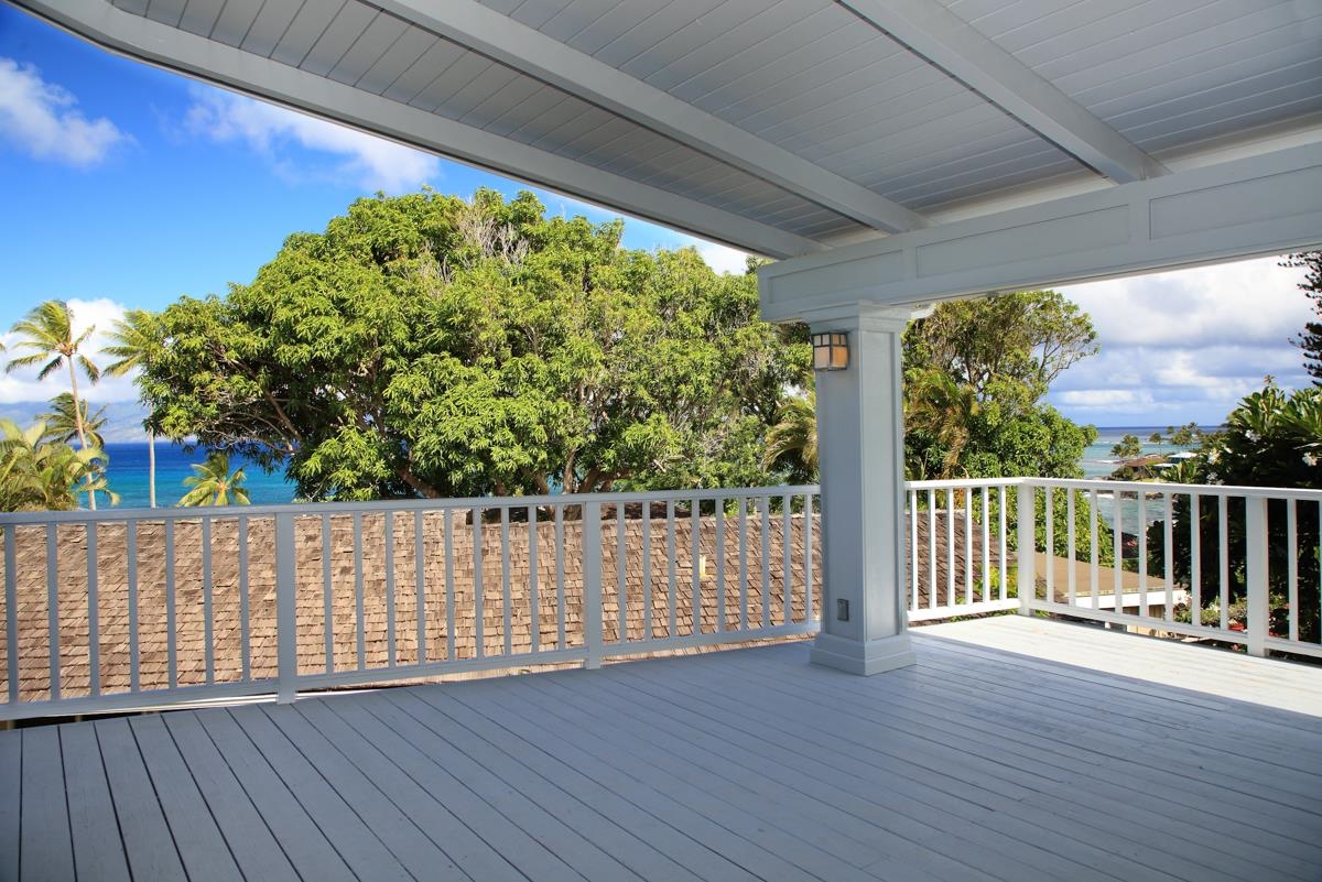 5045 Lower Honoapiilani Road, Unit 6 Lahaina, HI 96761 - Photo 5 of 30 a view of balcony with wooden floor