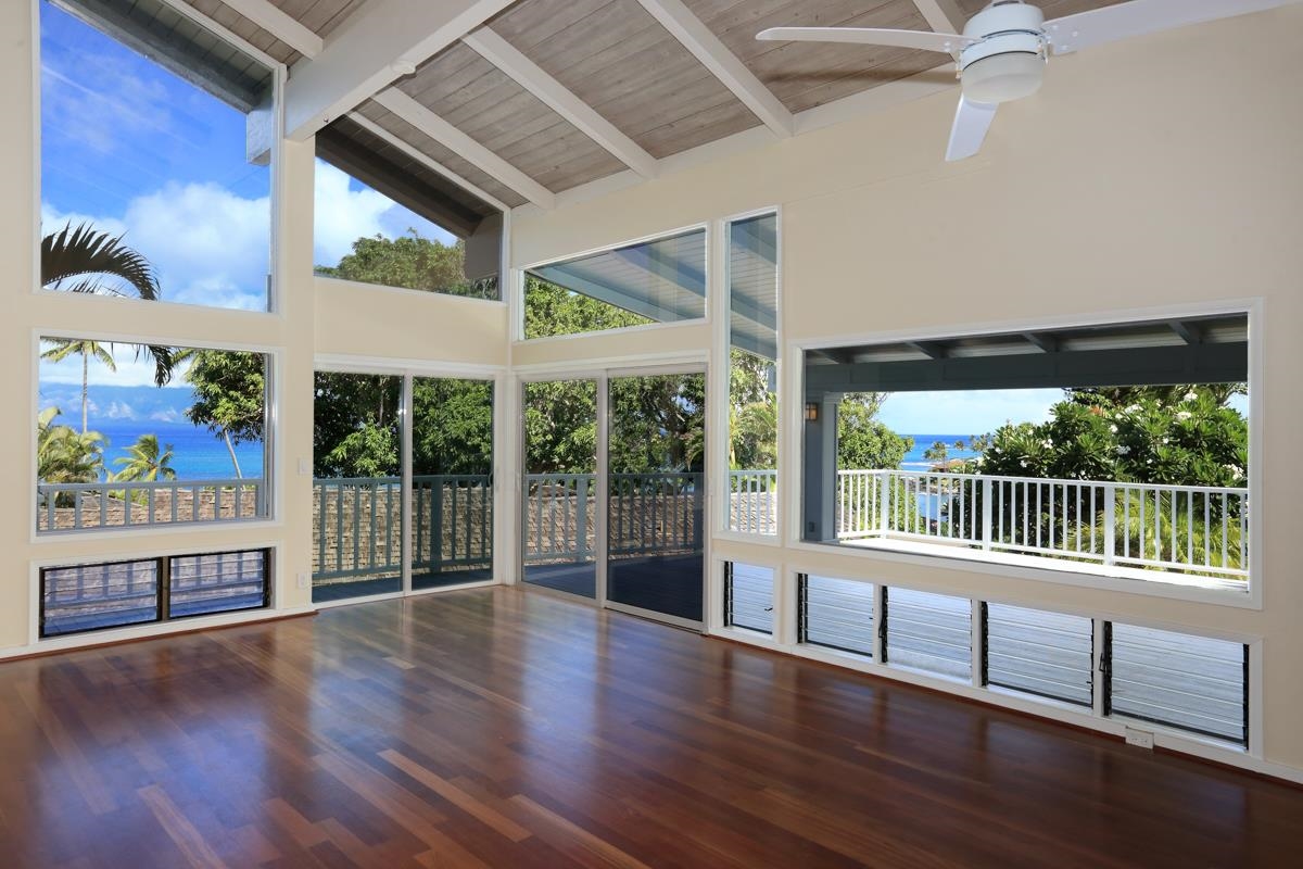 5045 Lower Honoapiilani Road, Unit 6 Lahaina, HI 96761 - Photo 10 of 30 a view of a room with wooden floor