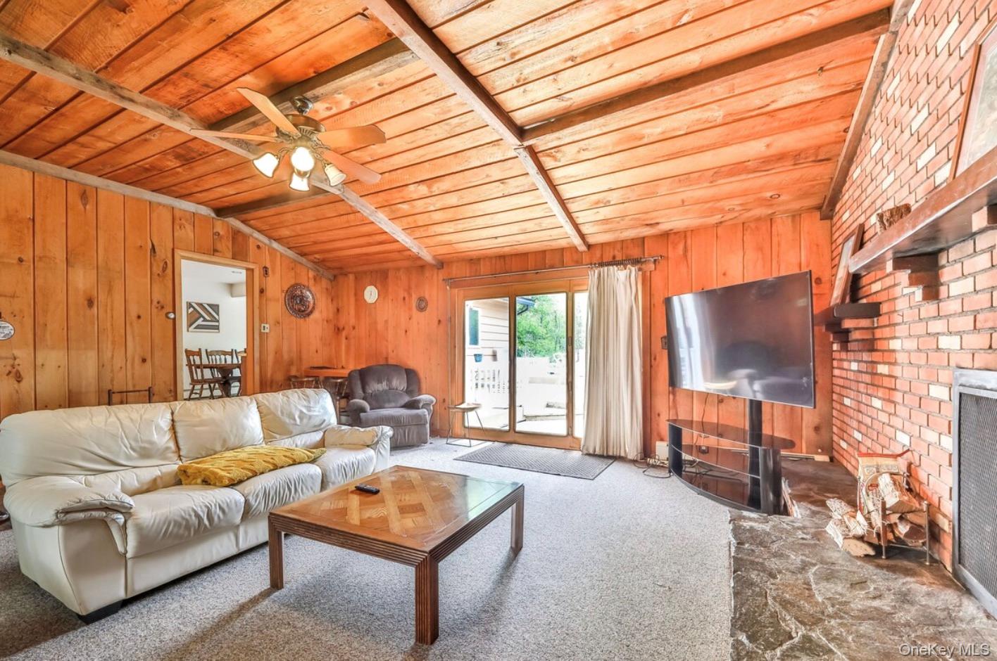 170 Maplecrest Road Windham, NY 12439 - Photo 12 of 36 a living room with furniture and a window