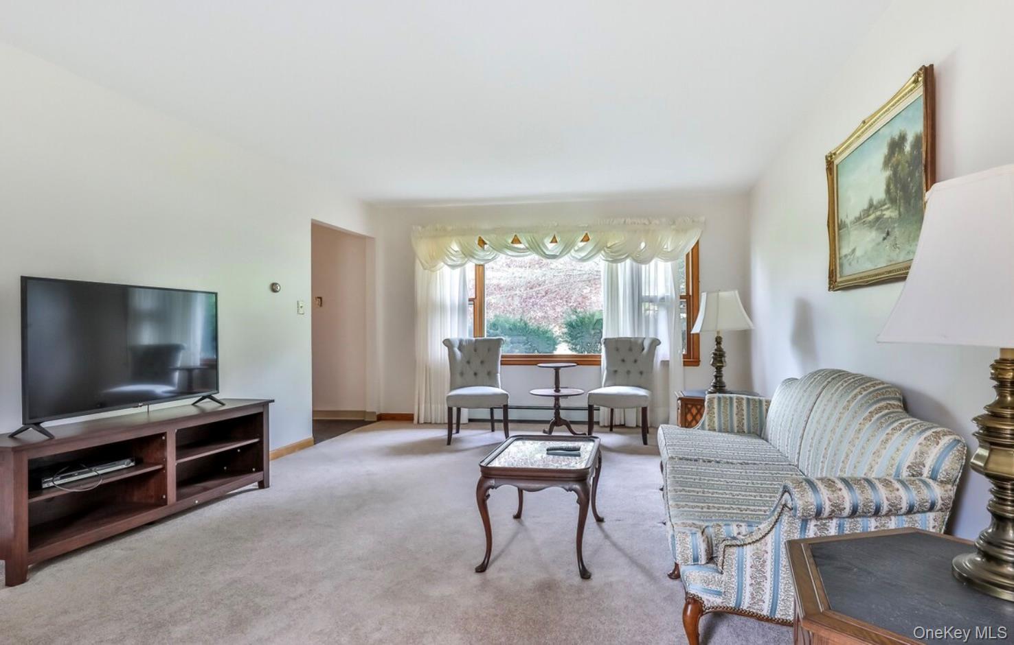 170 Maplecrest Road Windham, NY 12439 - Photo 20 of 36 a living room with furniture and a flat screen tv