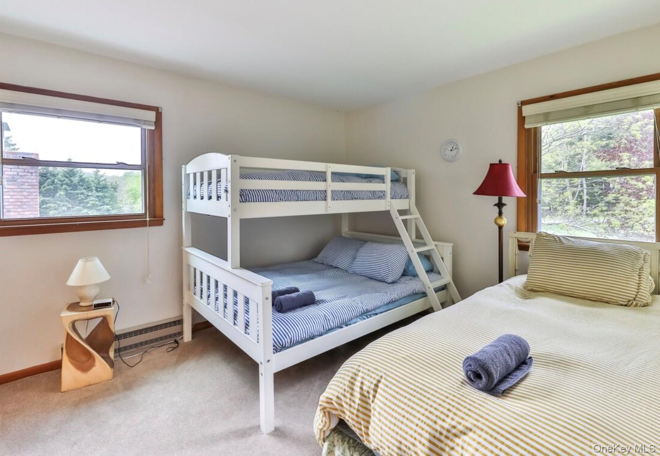 170 Maplecrest Road Windham, NY 12439 - Photo 26 of 36 a bedroom with two beds and windows