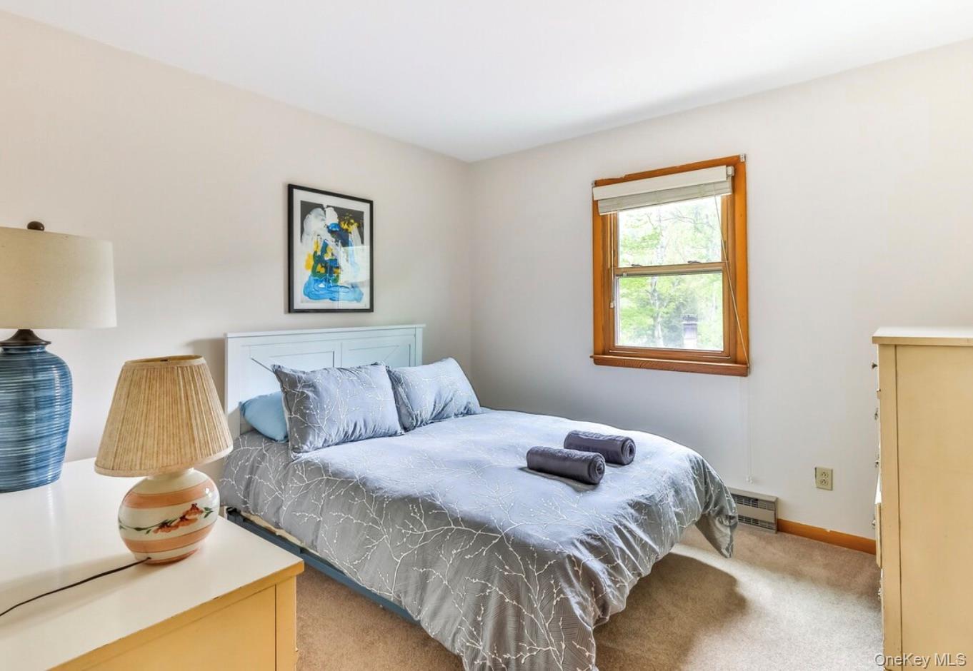 170 Maplecrest Road Windham, NY 12439 - Photo 27 of 36 a bedroom with a bed and wooden floor