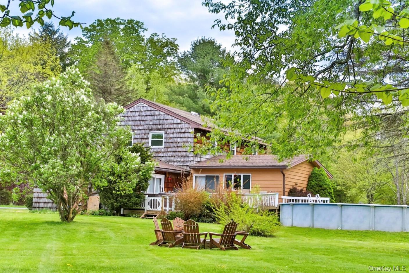 170 Maplecrest Road Windham, NY 12439 - Photo 5 of 36 a aerial view of a house with garden